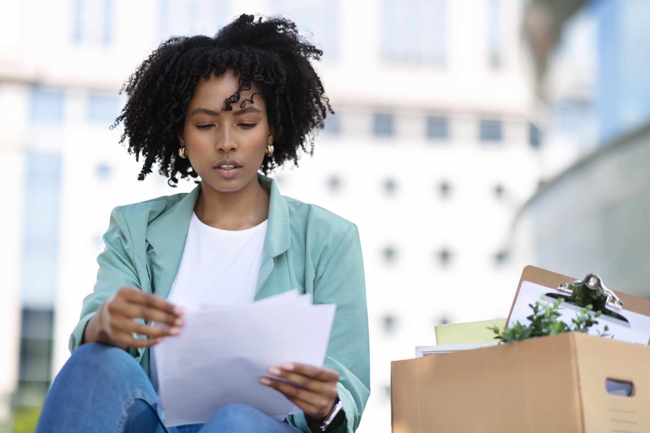 upset unemployed young black woman
