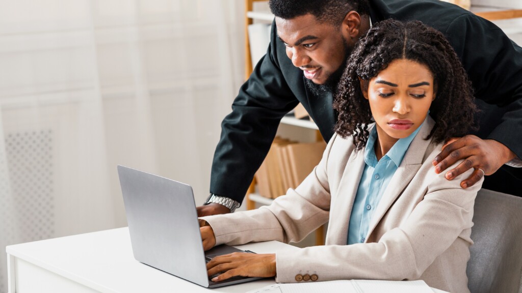 Sexual Misconduct in office boss touching shoulder